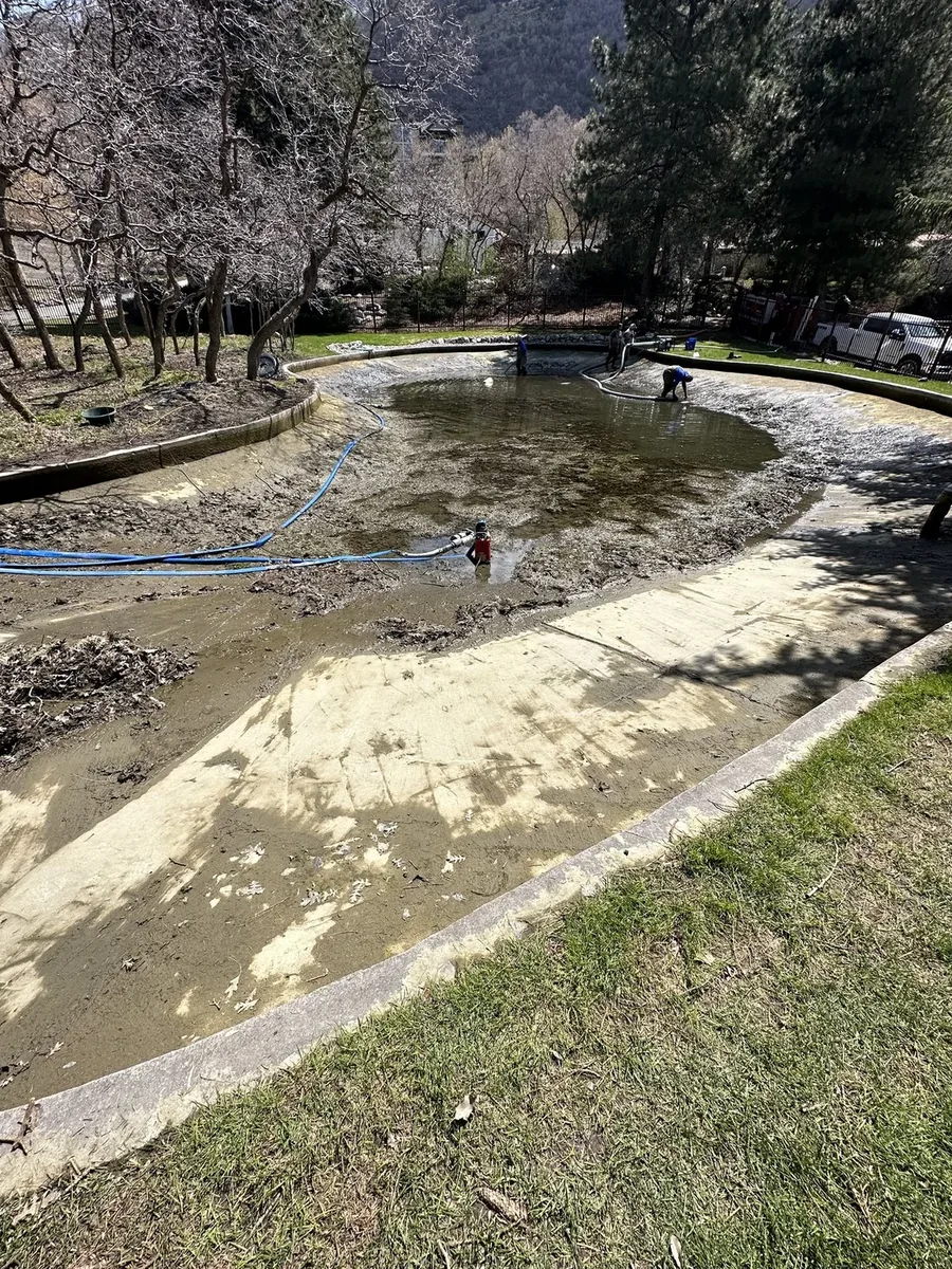 Pond edge sediment removal in Alpine, Utah